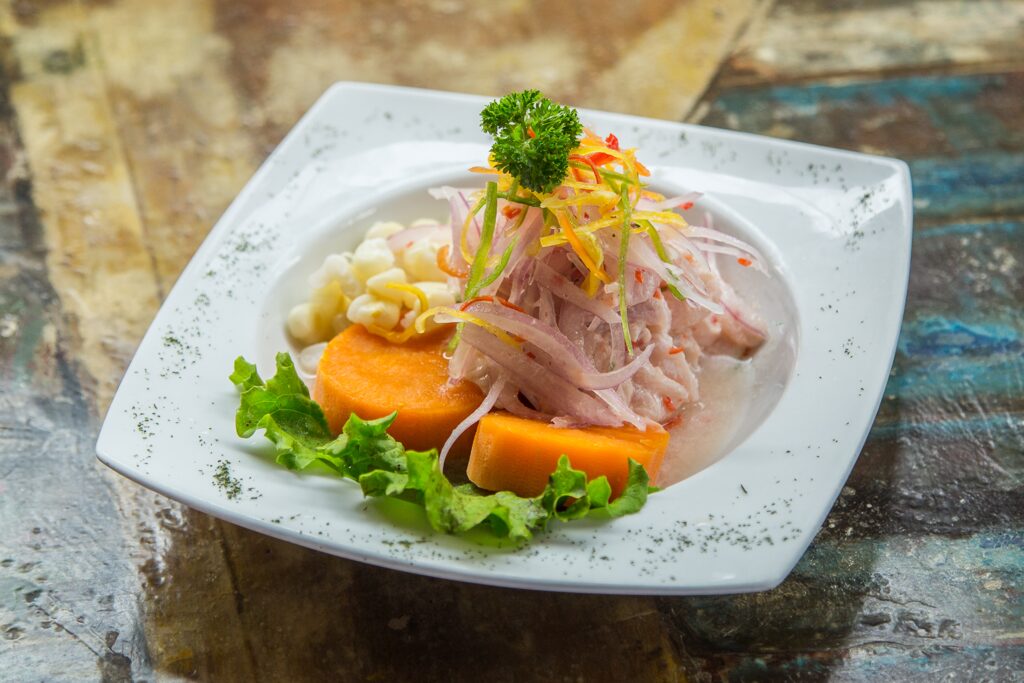 Ceviche, a dish made with raw fish or seafood marinated in citrus juices